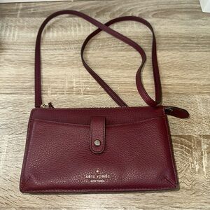 Kate Spade Jackson Small Tab Crossbody  in burg cherrywood color Pebbled Leather